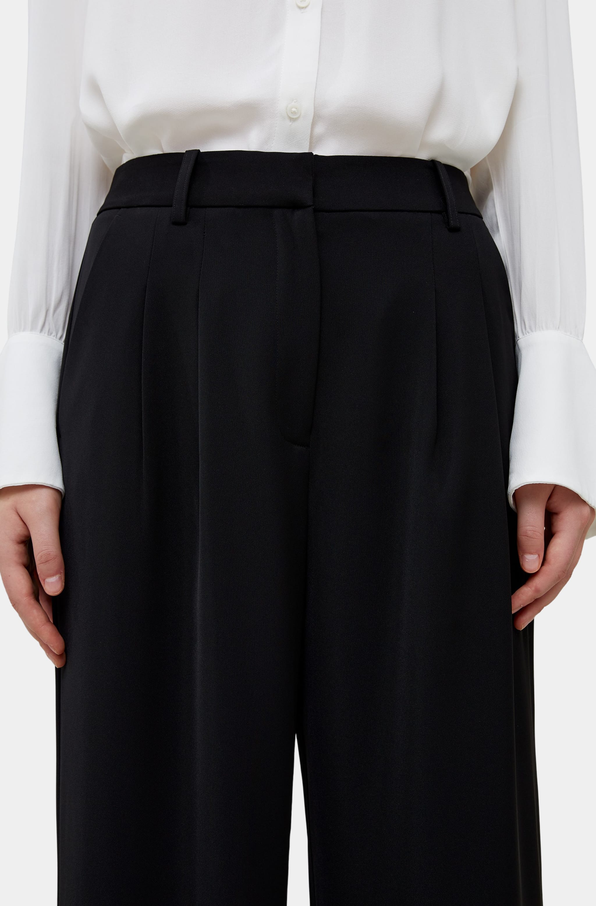 Close-up of black Harrie Suiting Trouser, waist detail