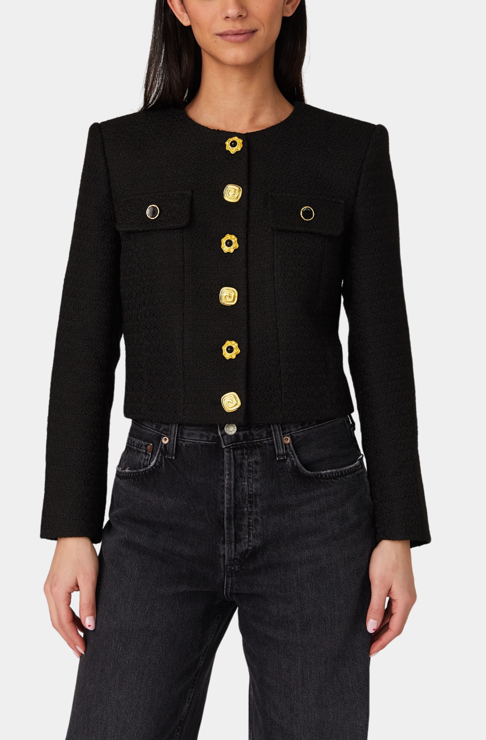 Black structured jacket with gold buttons, front view.