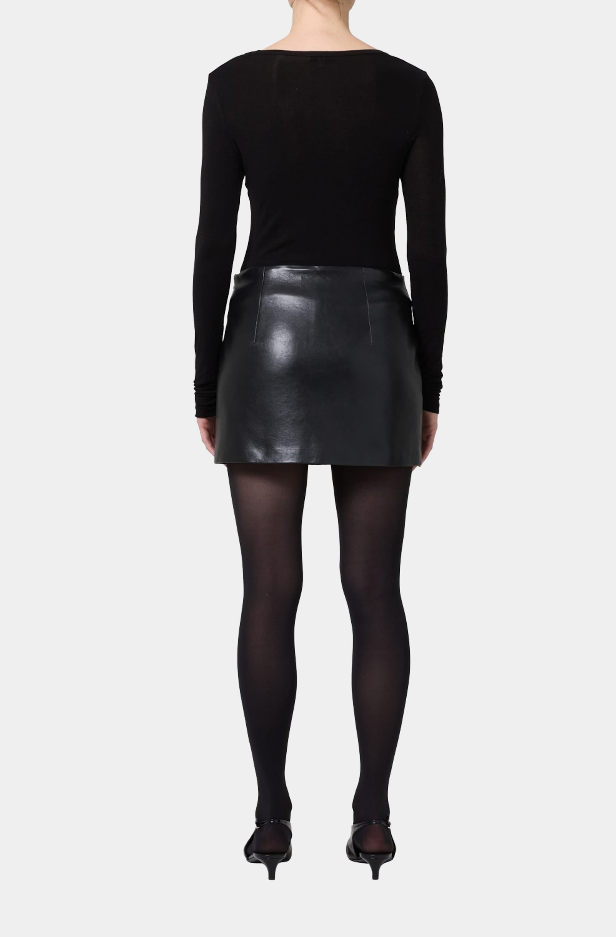 Back view of Agda Mini Skirt in black leather