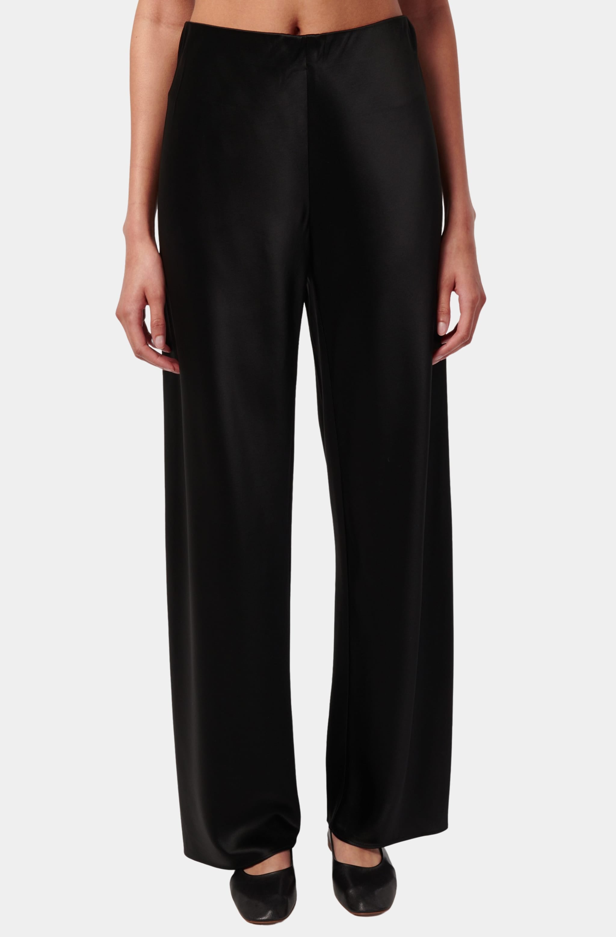 High-waisted silk pants, front view, showcasing sleek design