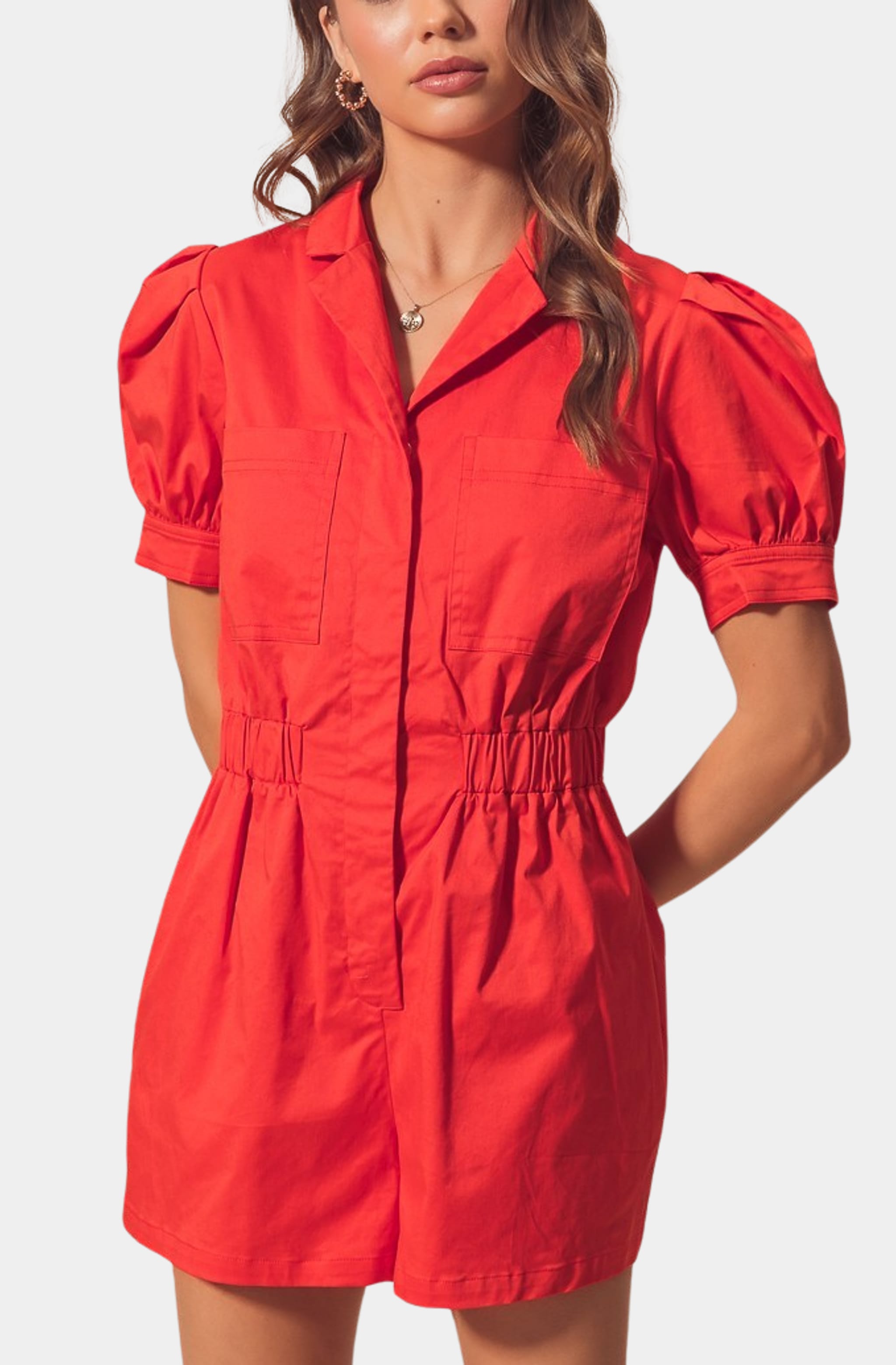 Front view of red Harlow Romper, button front design