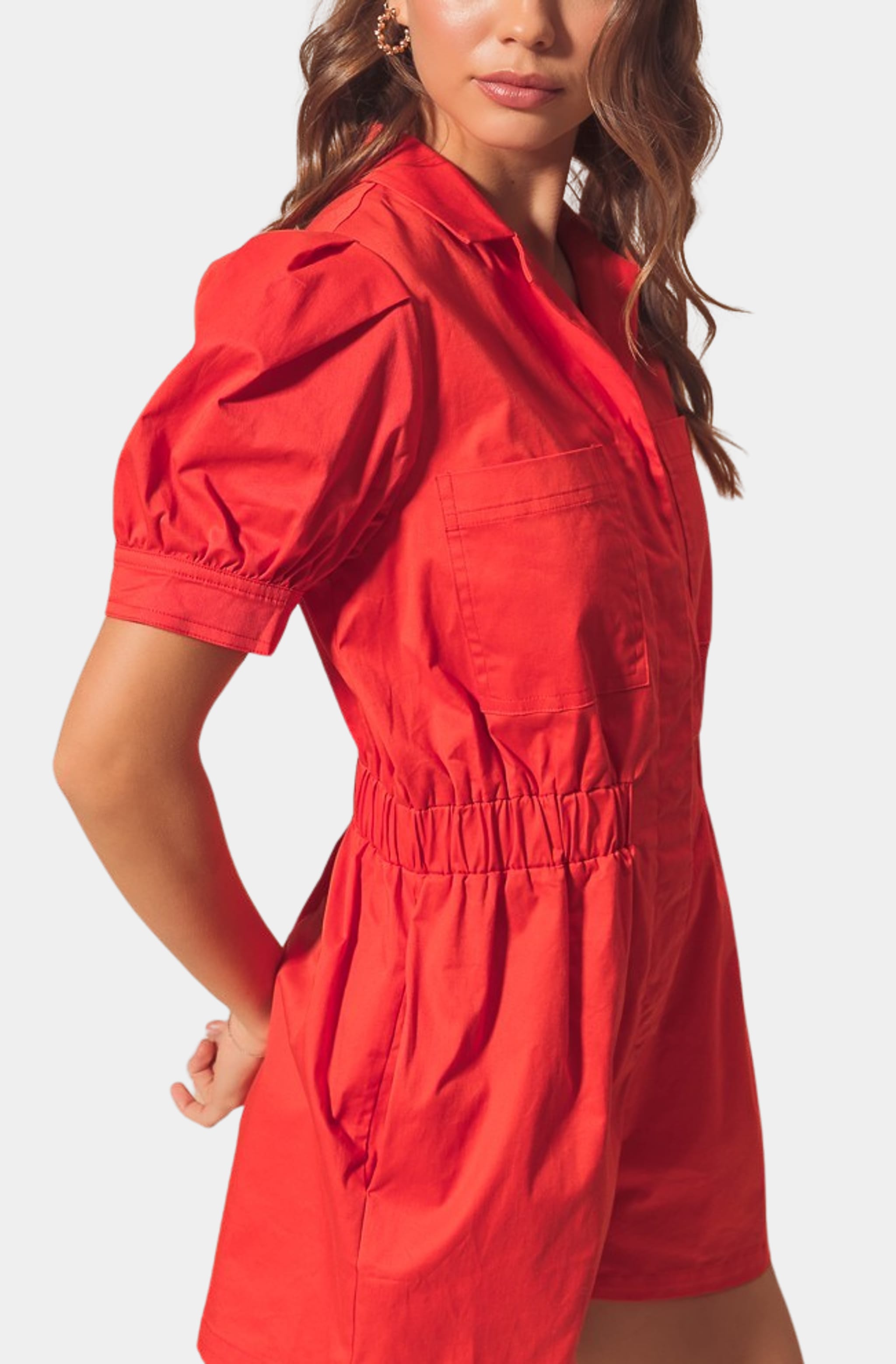 Side view of red Harlow Romper, cinched waist detail