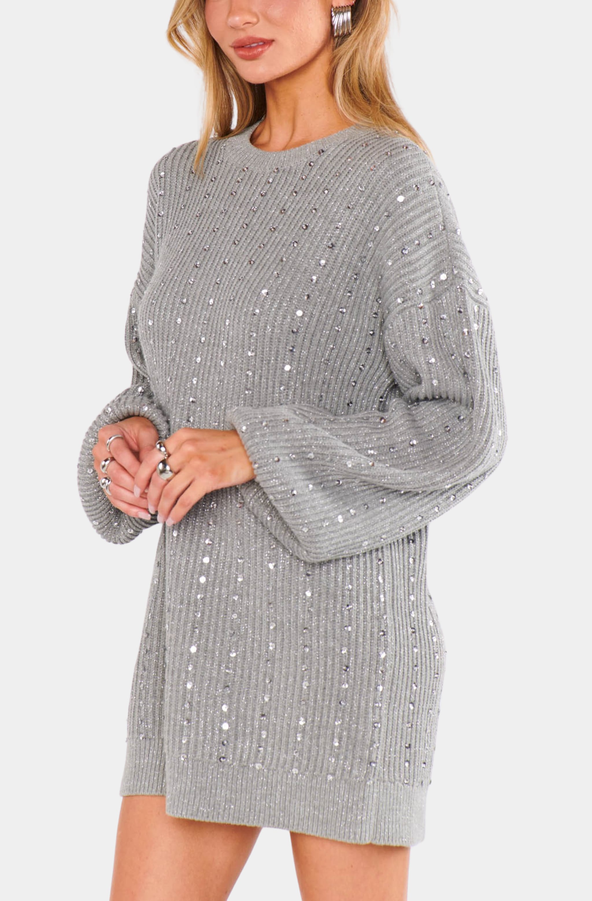 Close-up of sequin Social Sweater Dress with long sleeves